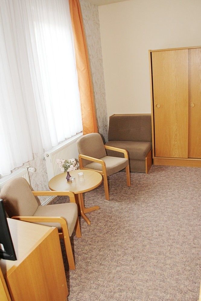 Hotel Pension Am Kurmittelhaus Бад Грунд Екстериор снимка